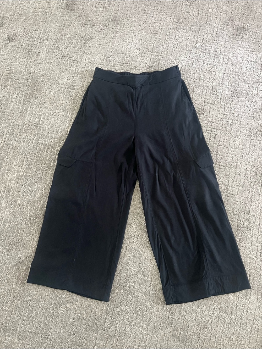 lululemon athletica Women's Black Wide-Leg Cropped Pants with side pockets.